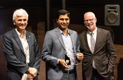 Mohesen Mahoor receiveing Award from Dean Holston and Dr. Ogmen