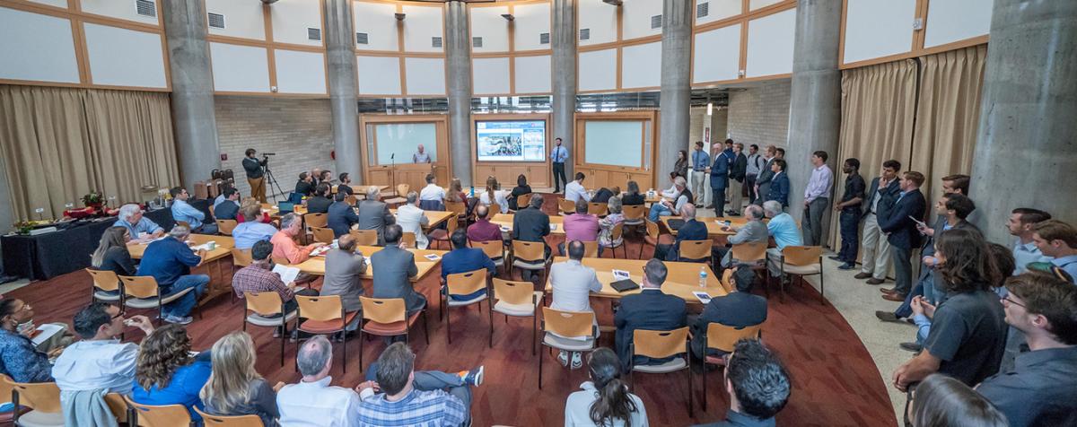 news presentation in large room