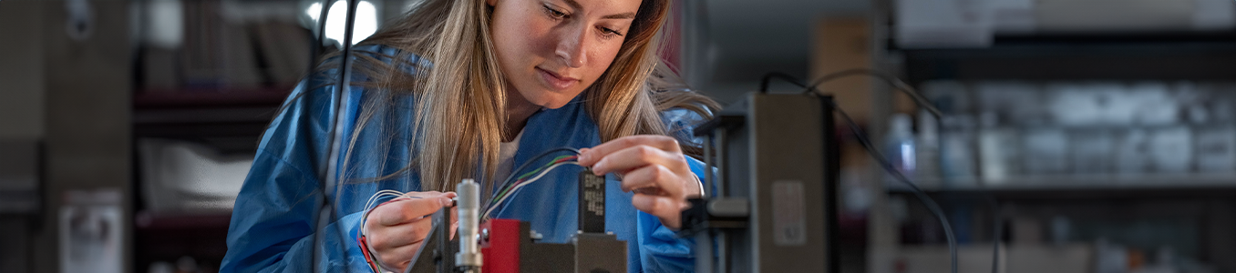 Woman working on machine