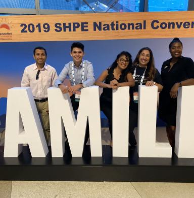 Elizabeth Gutierrez-Gutierrez with others at 2019 SHPE conference