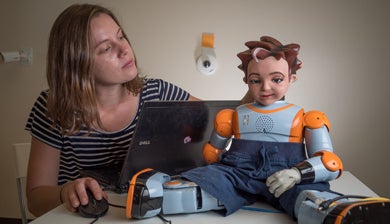 student with robot