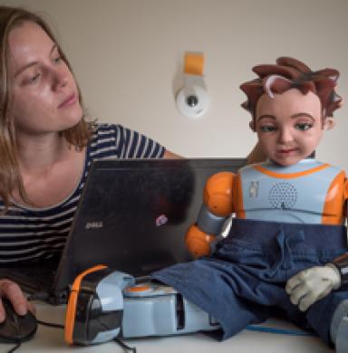student with robot